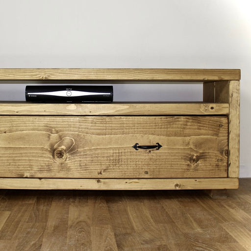 Solid wood TV unit in a medium oak finish, in a chunky rustic style. Handcrafted in the New Forest.